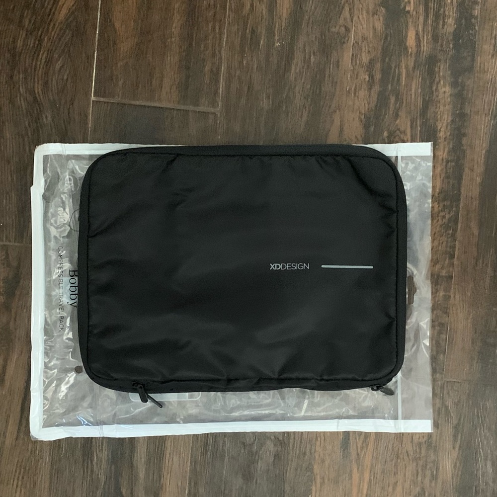 NEW COMPRESSIBLE TRAVEL BAG